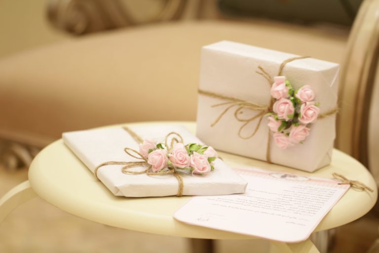a tray with a tray of flowers and a book