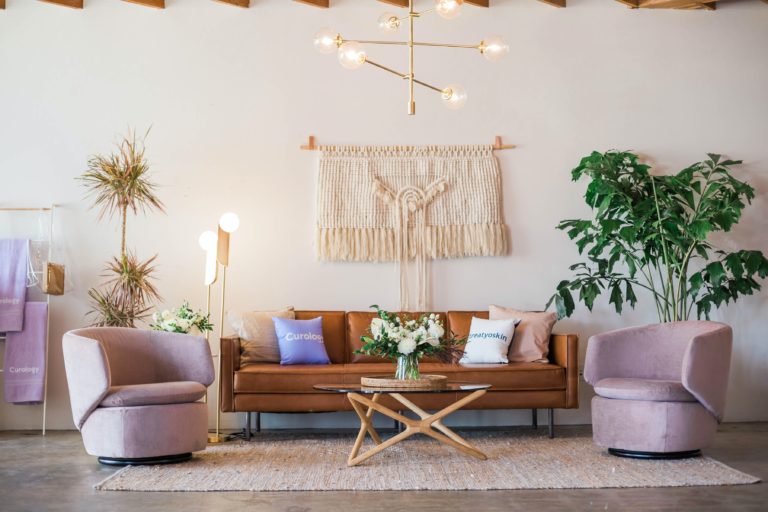 a living room with a couch and a table