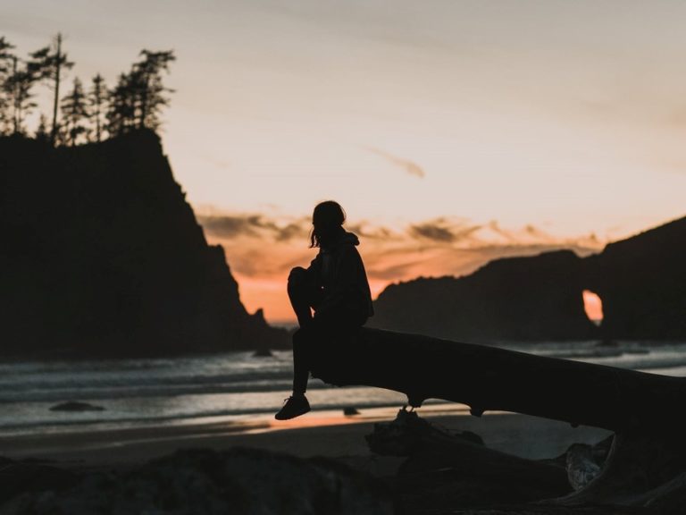 a man standing on a rock