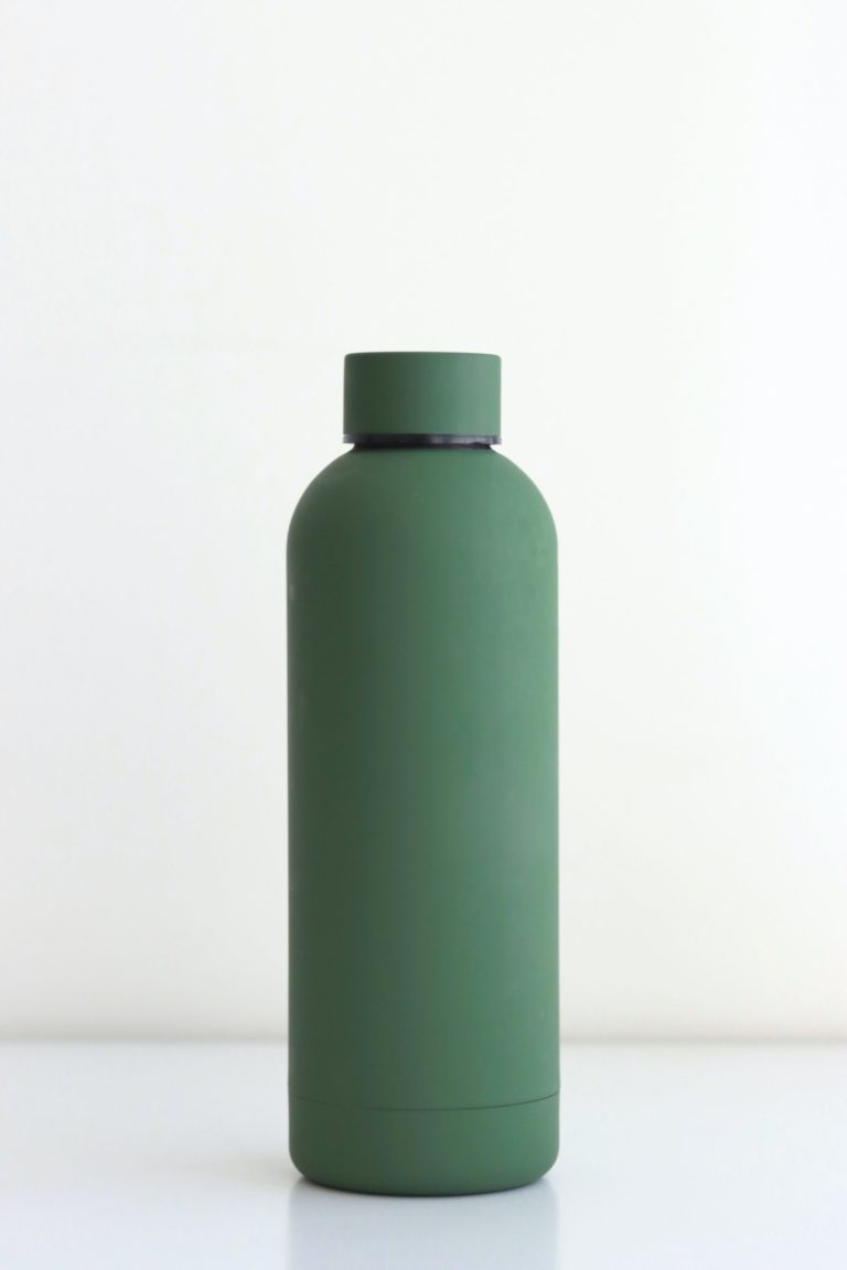 a green plastic bottle