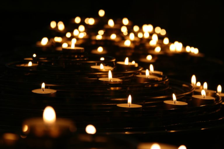 a group of lit candles