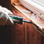 a man holding a tool