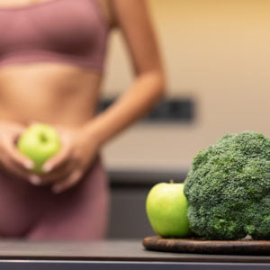 a woman cutting a lime