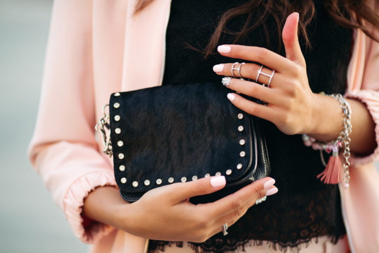 female holding purse