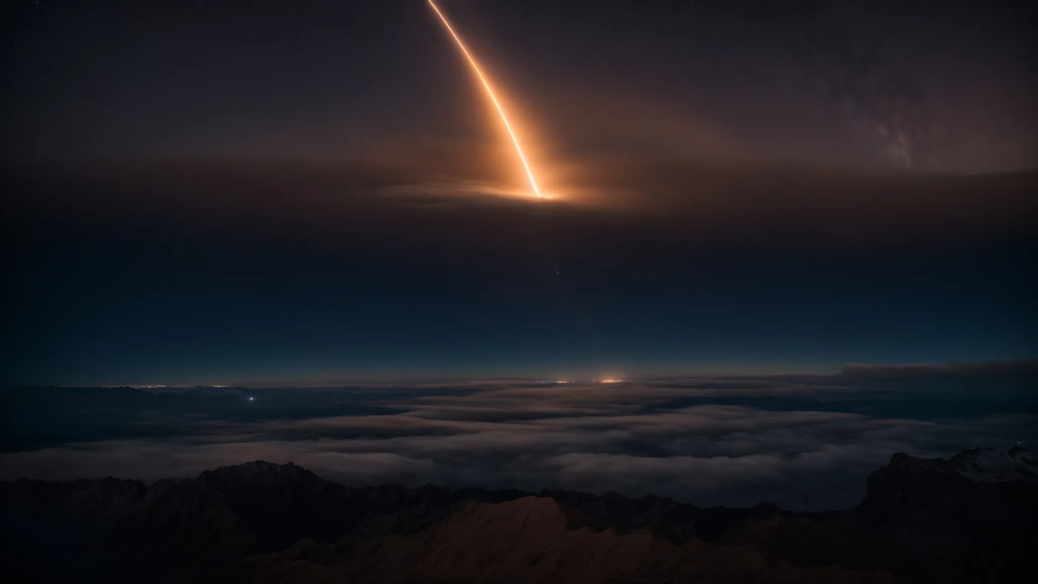 a blazing trail across the night sky marks a rocket's uncontrolled descent.