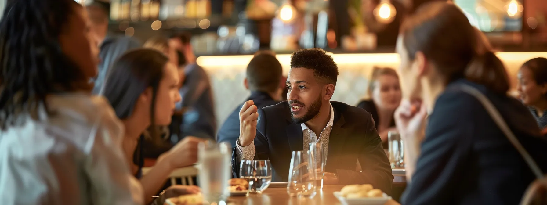business professionals engage in a focused discussion about mobile pizza catering advantages.